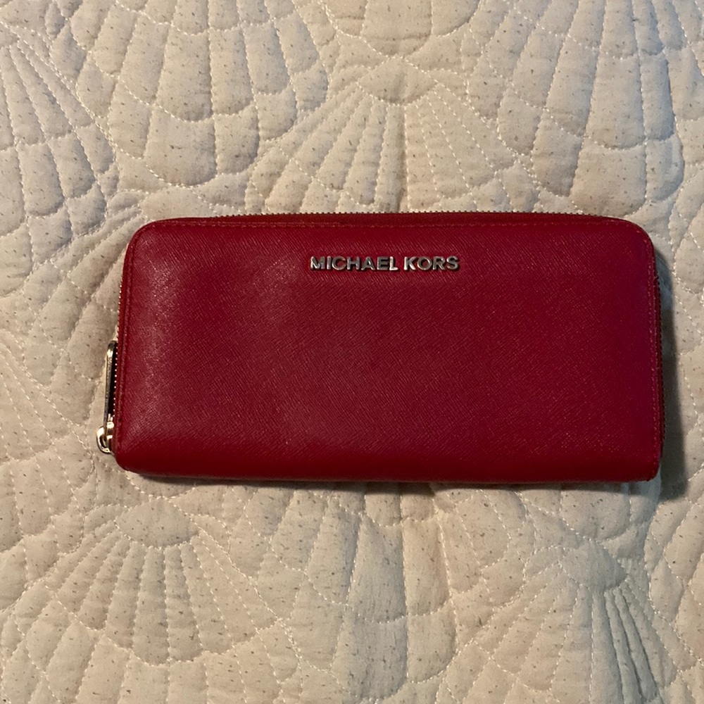 Red Michael Khors wallet. Used, but in great condition.